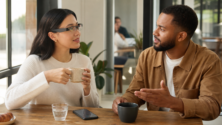 Caption glasses compared with a live transcription phone app during a conversation