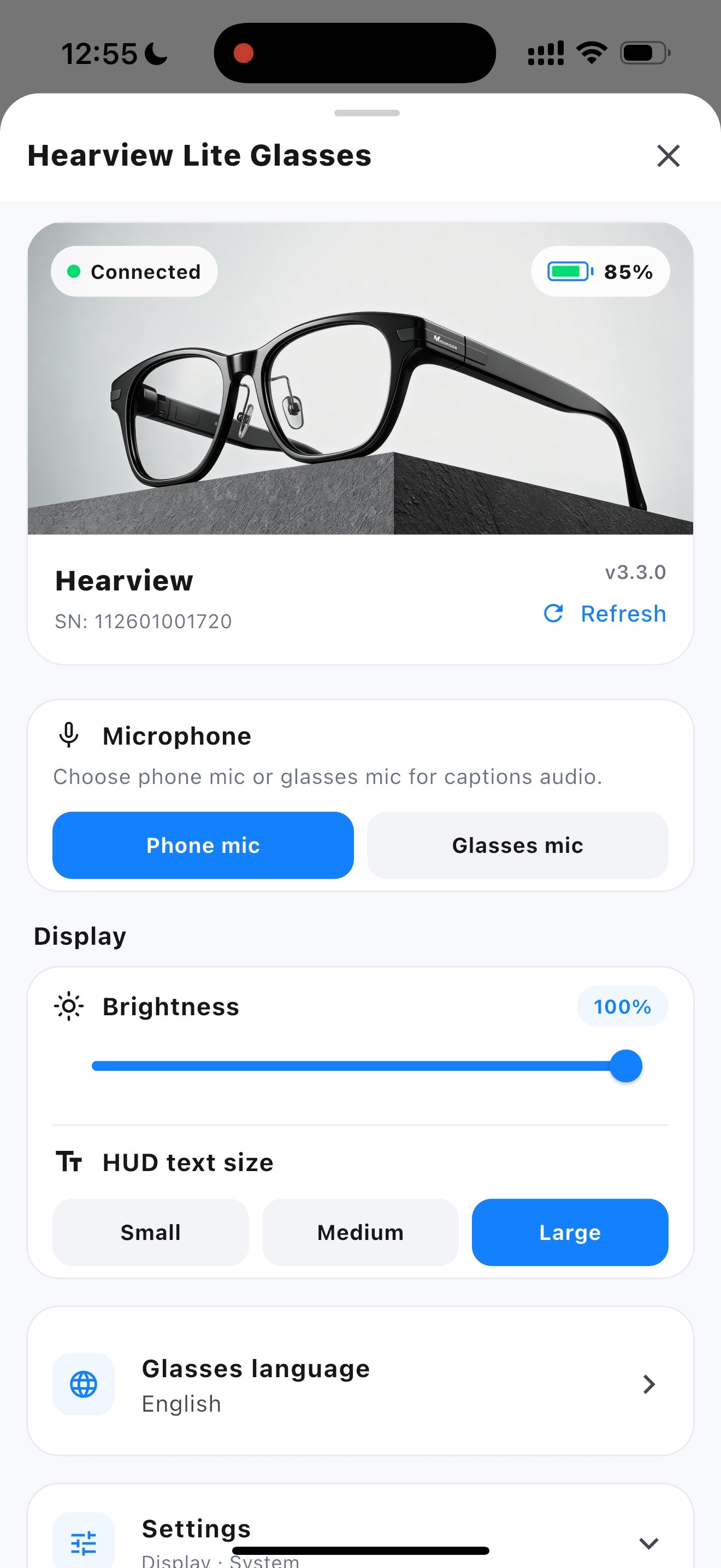 Hearview App showing connected glasses, microphone selection, brightness, and caption controls